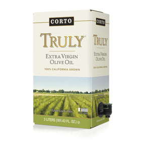 Corto TRULY olive oil bottle showcasing floral notes for finishing dishes.