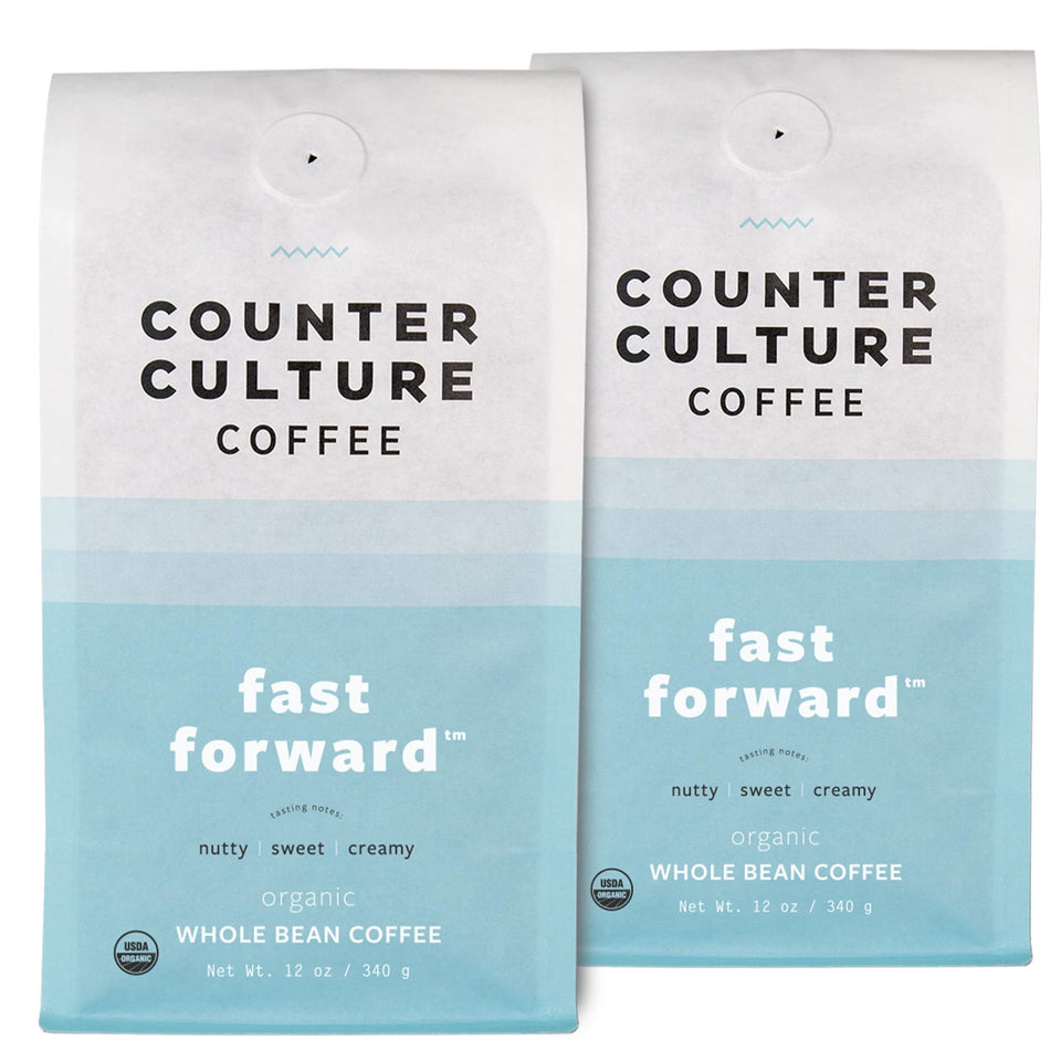 Counter Culture Coffee Fast Forward bag front with fresh whole beans for aroma.