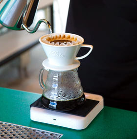 Counter Culture Coffee Big Trouble steaming mug showcases inviting aroma.