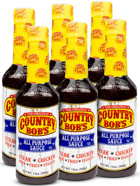 Country Bob's All Purpose Sauce bottle pour for versatile flavor.