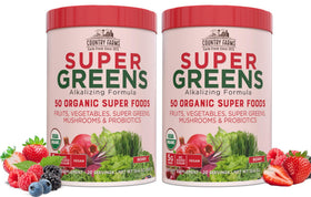 Country Farms Super Greens Berry powder in a jar supports daily nutrition.