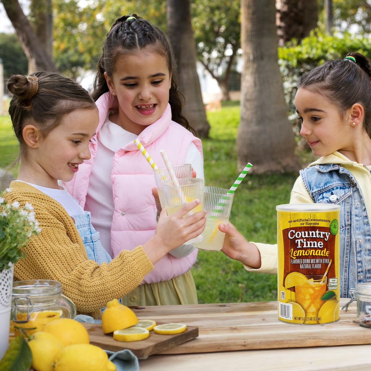 Country Time lemonade powder glass pitcher with ice implies cool summer refreshment.
