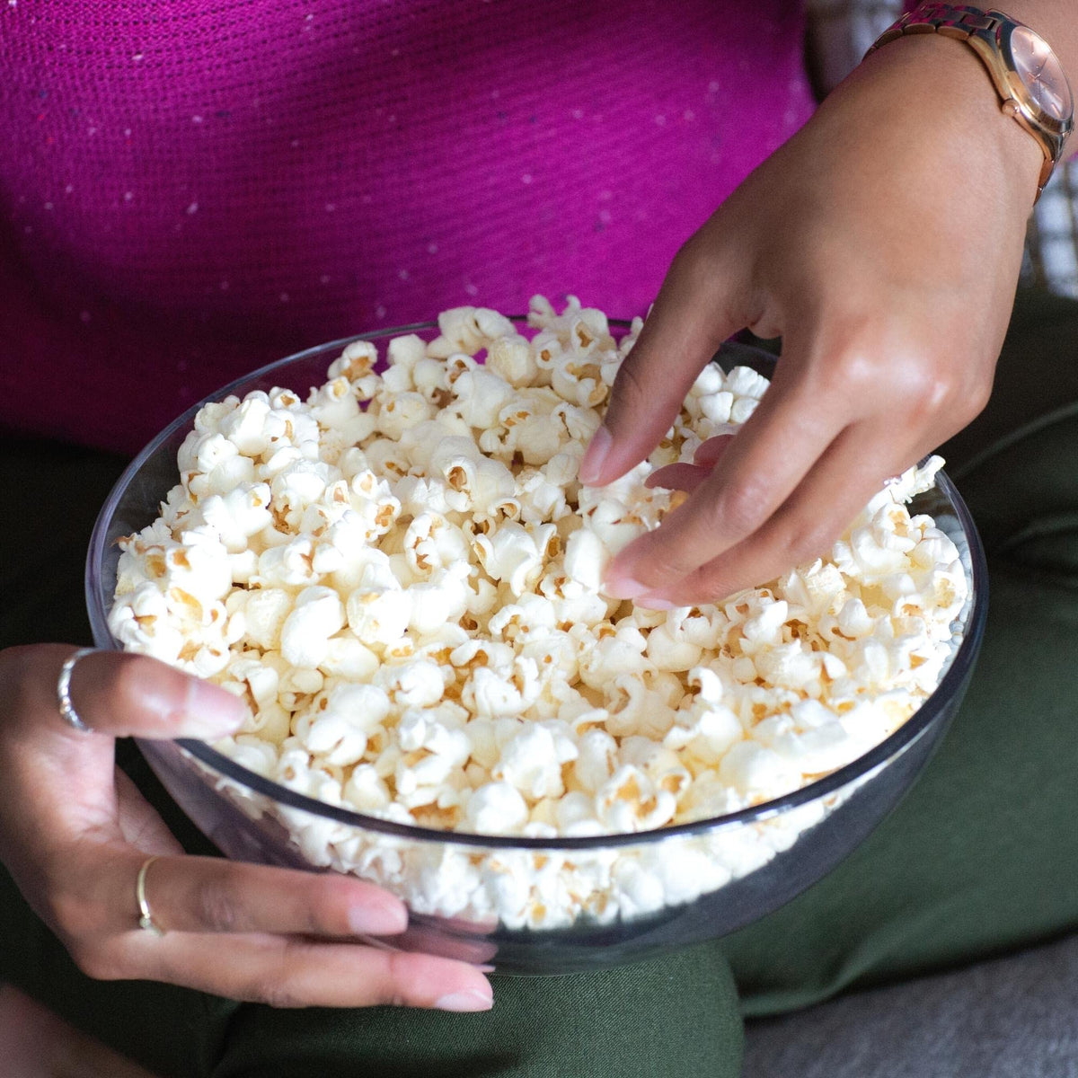 Cousin Willie's White Cheddar popcorn on a kitchen counter, highlighting whole grain and gluten-free.
