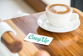 Cozy Up dark chocolate notes enhance a smooth, bold cup.