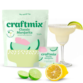 Craftmix Classic Margarita mixer packet being poured into a glass for a refreshing low-cal drink.