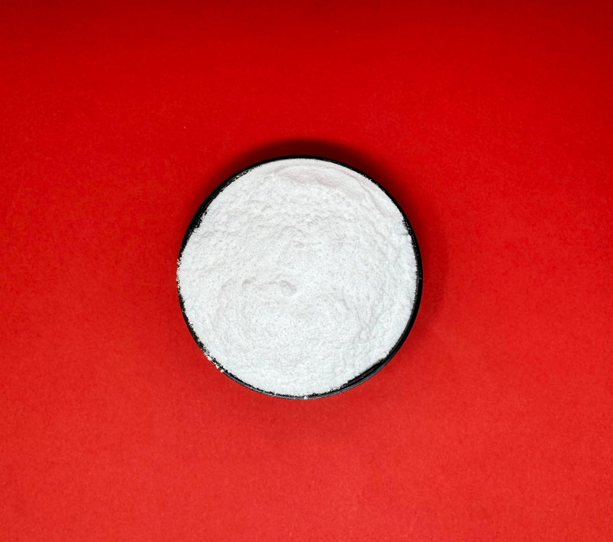 Crait Lactic Acid Powder measured for candy making and tangy treats.