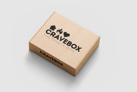Inside CRAVEBOX Easter Snack Box showing a varied snack assortment for study sessions.
