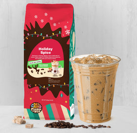 Closeup of Crazy Cups decaf holiday variety pack box displaying three flavors