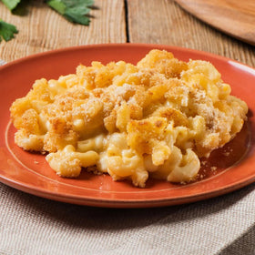 Creamette elbow macaroni cooking, ready in about 15 minutes with sauce.