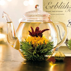 Creano Tea Flowers Mix with rose bloom unfurling in a teapot, floral aroma.