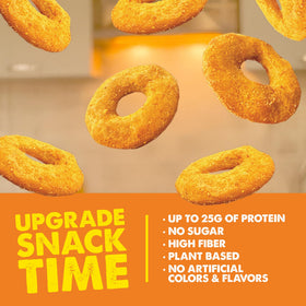 CRISP POWER Protein Pretzels cheddar bite shot captures savory crunch on the go.