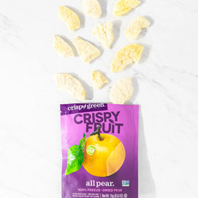 Crispy Green family enjoying the pear snacks on a road trip