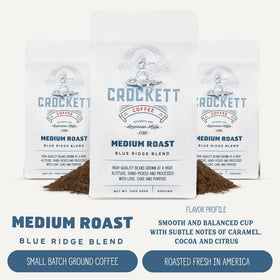 Crockett Coffee medium roast ground with cup steam showing a smooth finish