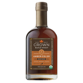 Crown Maple bottle-amber-syrup ready to pour over pancakes with rich organic sweetness.