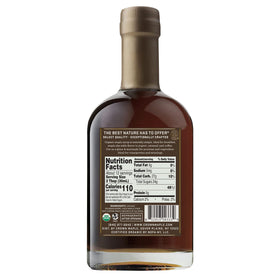 Close up of Crown Maple Bourbon Barrel Aged syrup bottle label