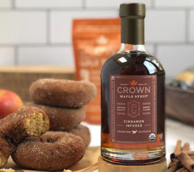 Crown Maple Cinnamon Infused Syrup being poured over waffles adds warm, spicy depth