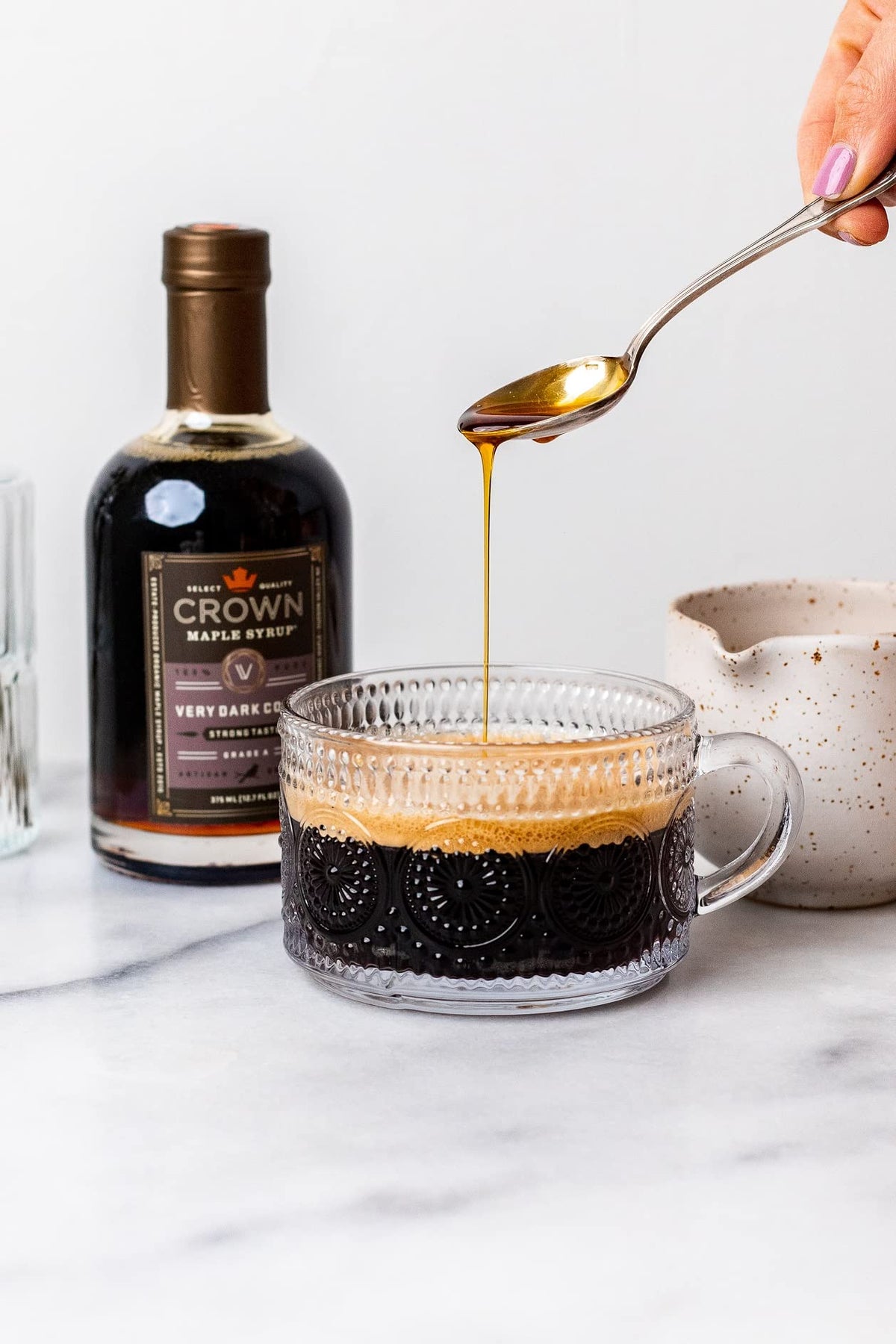 Crown Maple Very Dark Color syrup drizzle over pie slice for indulgent finish