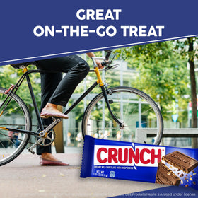 CRUNCH bite-snap-melt displaying creamy chocolate and crisp crunch