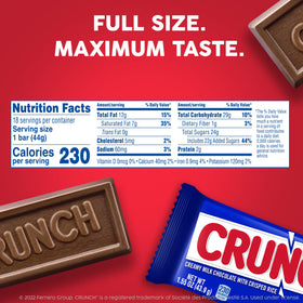 Holding a CRUNCH bar to show crisped rice crunch.