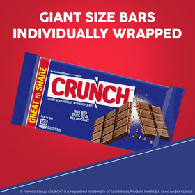 Crunch Giant Bar on a desk with coffee signals a tasty work-day pick-me-up.