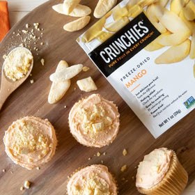 Crunchies Mango freeze-dried fruit on a colorful plate, vibrant and versatile.