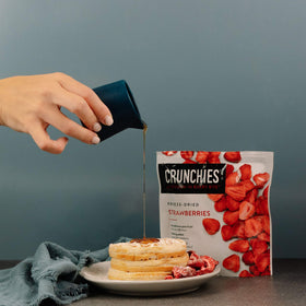 Crunchies freeze-dried strawberries packaging showing quality and purity.