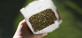 CRUZ DE MALTA Yerba Mate leaves closeup showing rich texture for authentic flavor.