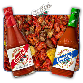 Crystal Extra Hot Sauce drizzle over a dish for fiery kick.