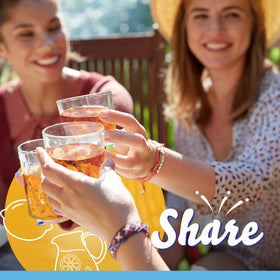 Glass of lemon iced tea with slice, showcasing refreshing flavor.