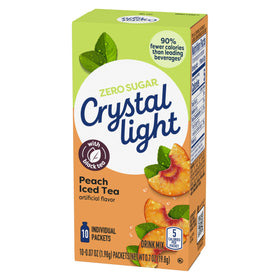 Stack of Crystal Light Peach Iced Tea boxes in kitchen.