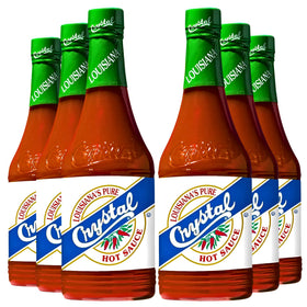 Crystal Original Hot Sauce bottle on kitchen counter, ready to spice meals.