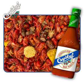 Crystal Original hot sauce on tacos enhances savory depth with a crisp finish.