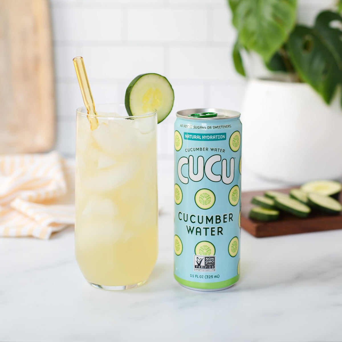 CUCU electrolytes hydration can with ice beside a water bottle, ideal for active days.