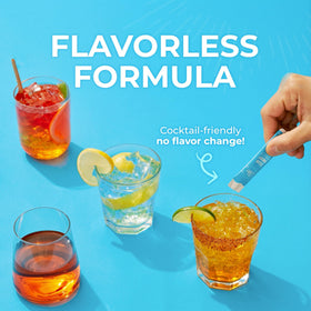 Curly's Clean Energy Stick mixed into a beverage in a clear glass