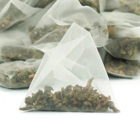 CUSHLA GABA Oolong brew cup displaying orange-brown infusion and caramel notes