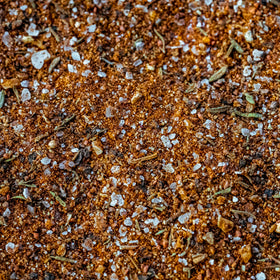 Cuso Cuts Cajun seasoning on jambalaya for robust spice
