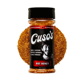 Cuso's Cuts Hot Honey BBQ rub bottle ready for grilling, boosting beef flavor.