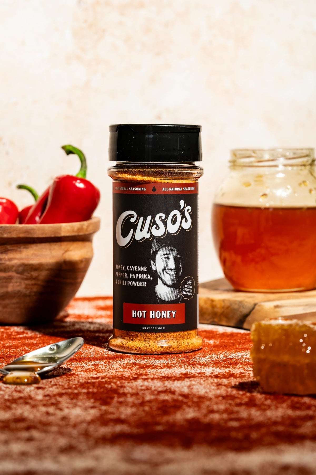 Spice blend of Cuso's Cuts Hot Honey BBQ rub on a spoon, for beef.