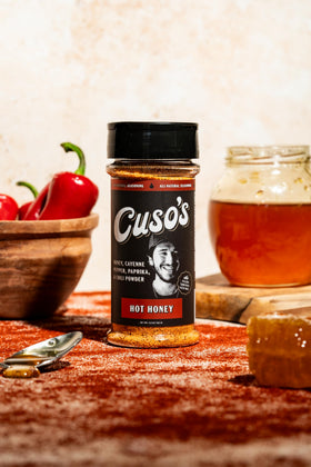 Spice blend of Cuso's Cuts Hot Honey BBQ rub on a spoon, for beef.