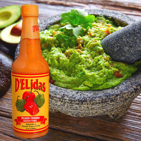 D'ELidas Habanero Hot Sauce serving suggestion complements wings and grilled meats.