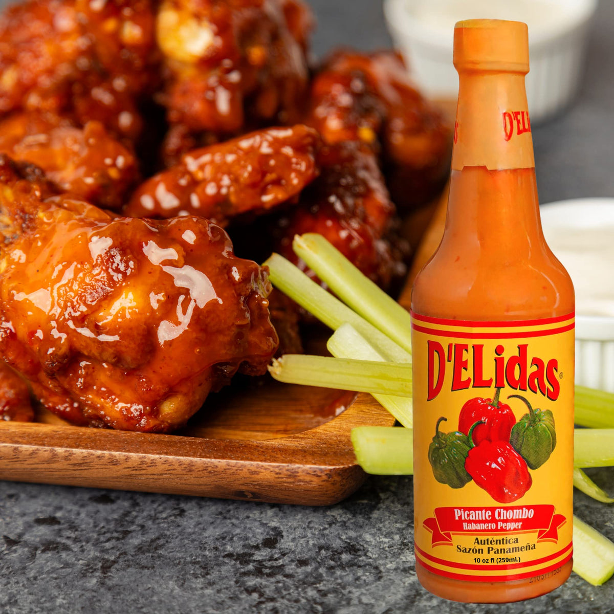 D'ELidas Habanero Hot Sauce on wings, showcasing heat and flavor depth.