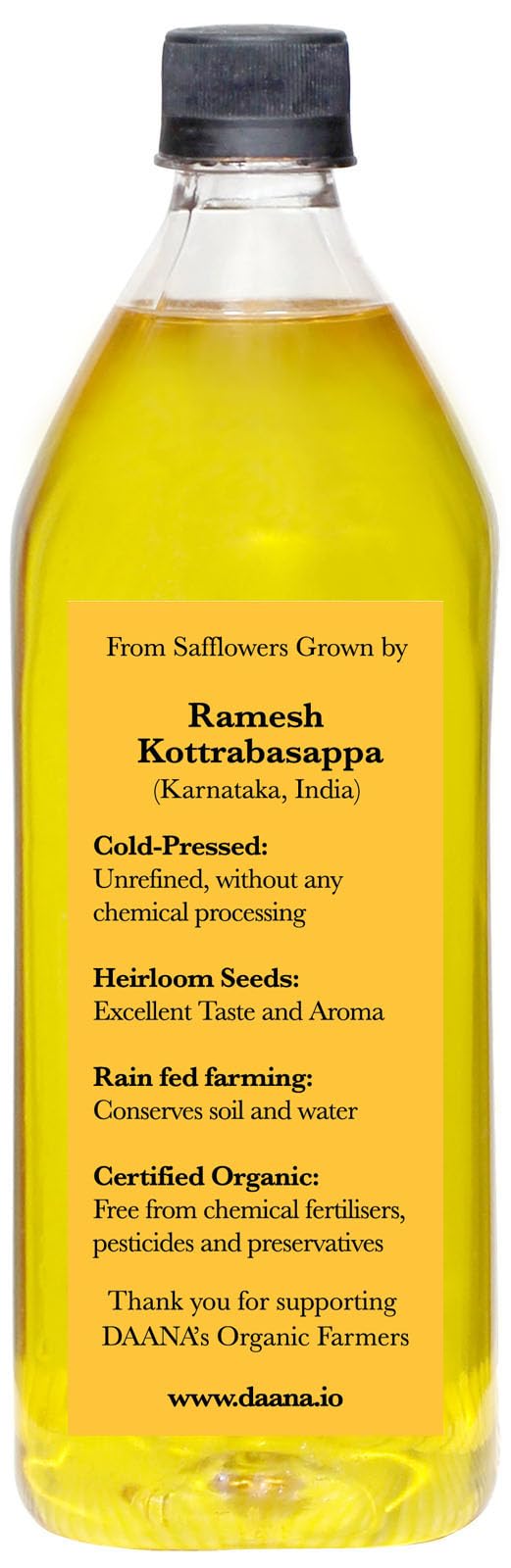 Drizzling Daana safflower oil on a salad for glossy finish and flavor.