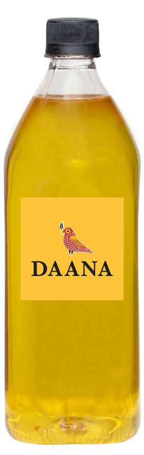Close-up of DAANA oil in a golden liquid showing rich color and texture