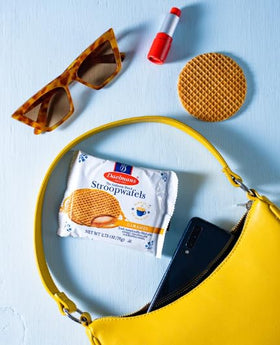 Daelmans Stroopwafel caramel cream-filled cross-section with rich texture.