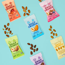 Daily Crunch mini-pack-on-the-go image demonstrating convenient 1.5 ounce servings
