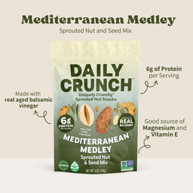 Daily Crunch on-the-go snack pack held in hand