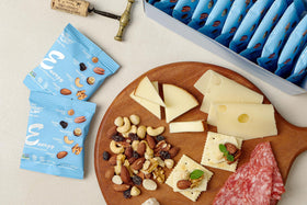 Daily Gourmet Nuts back panel highlighting gluten-free and non-GMO ingredients.