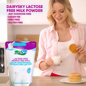 DairySky lactose-free milk powder in baking setup with measuring cups for versatile recipes.