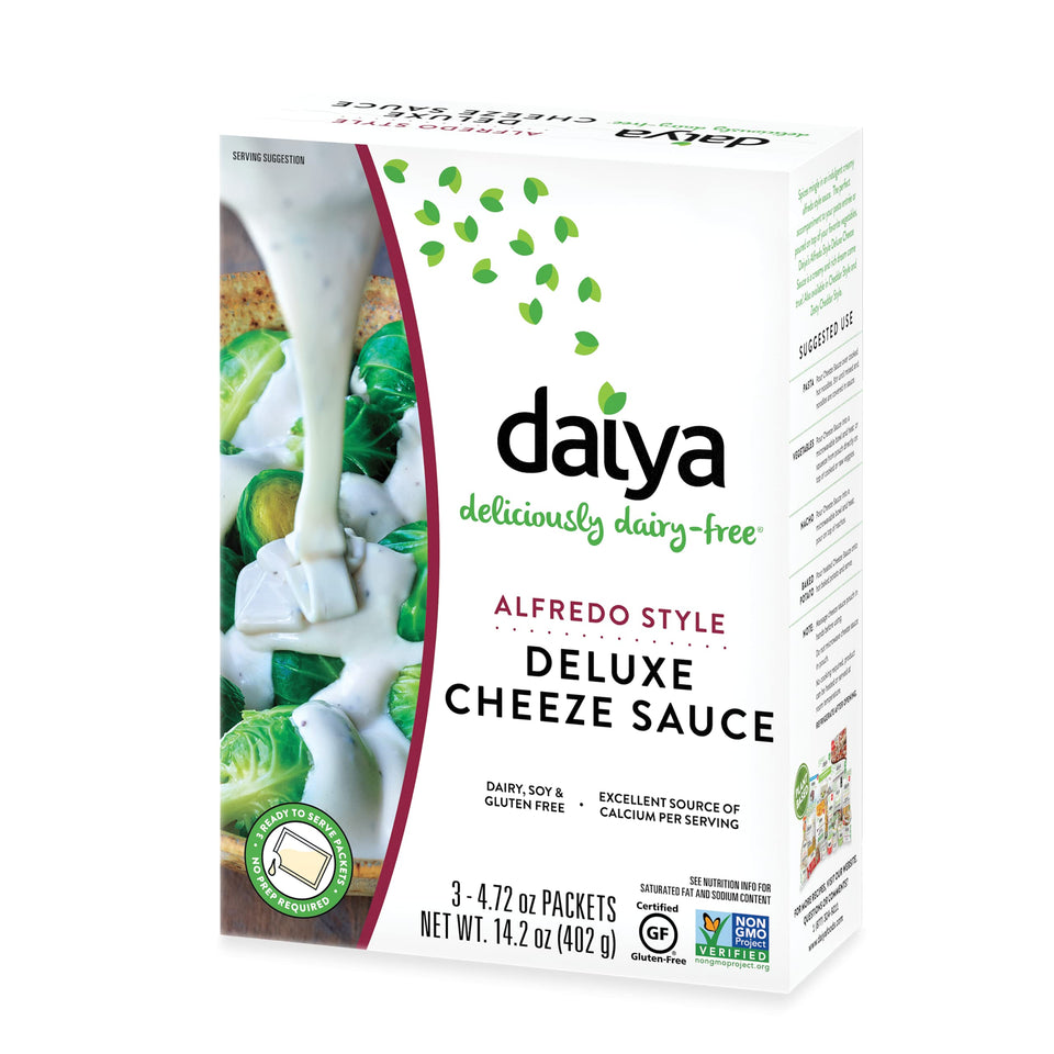 Daiya Alfredo sauce packet on shelf, dairy-free vegan option.