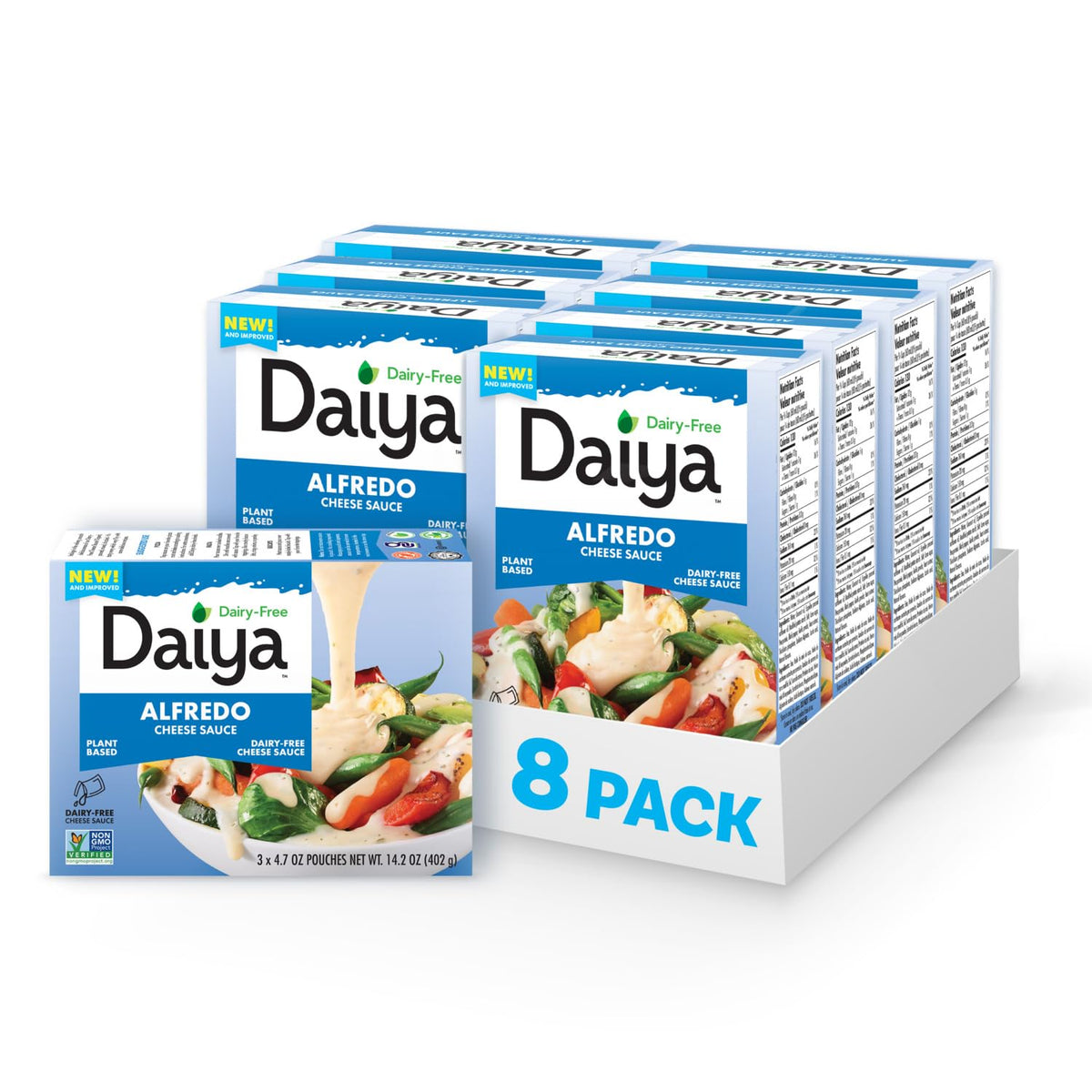 Daiya Alfredo sauce being poured onto pasta for a creamy dairy-free meal.